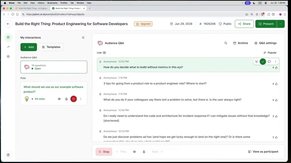 An audience Q&A dashboard highlights a question about deciding what to build without metrics.