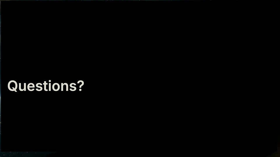 Black slide with the word Questions.