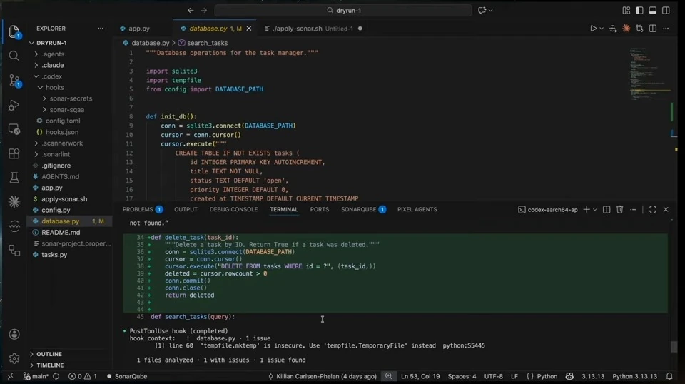 Editor showing a task deletion function and a terminal warning about an existing temporary-file issue.