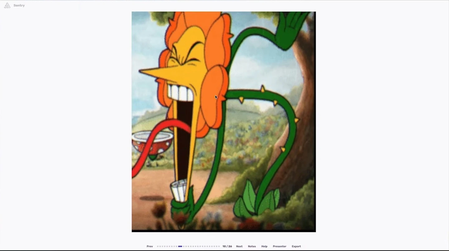 An orange cartoon flower shouting with its mouth wide open.