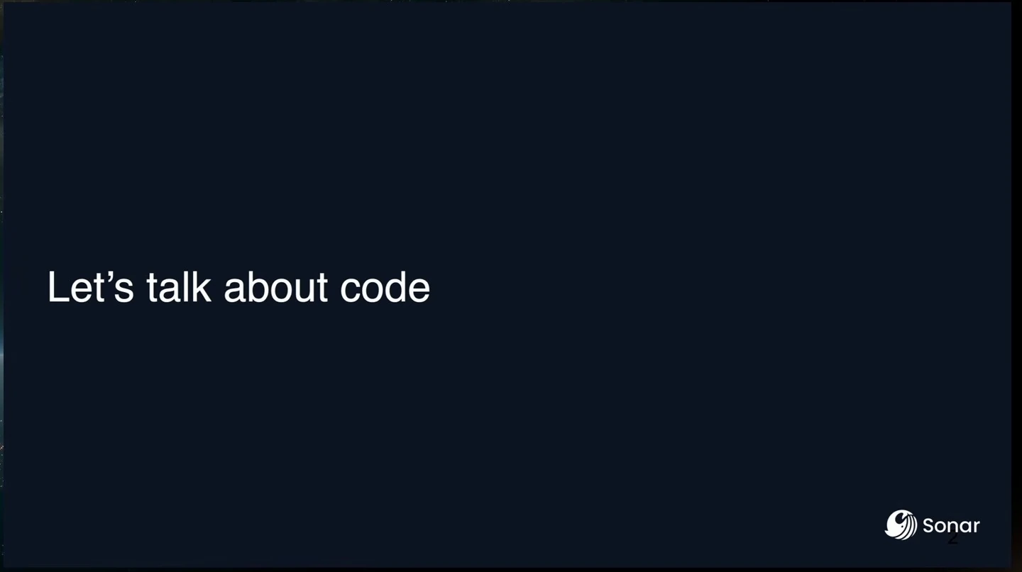 Dark slide introducing a discussion about code.
